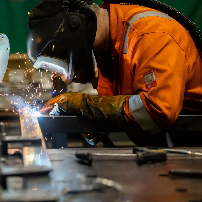 bifolding gates manufacturer working on a new gate.